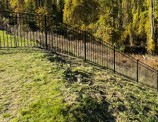 Aluminum fence installed with i Drive Power System steel posts