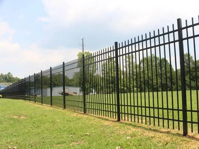 Ornamental iron fence installed with i Drive Power System steel posts