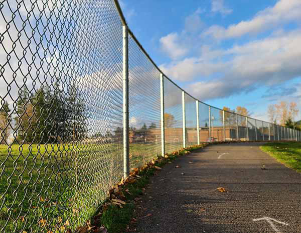 School perimeter fence installed with i Drive Power System steel posts