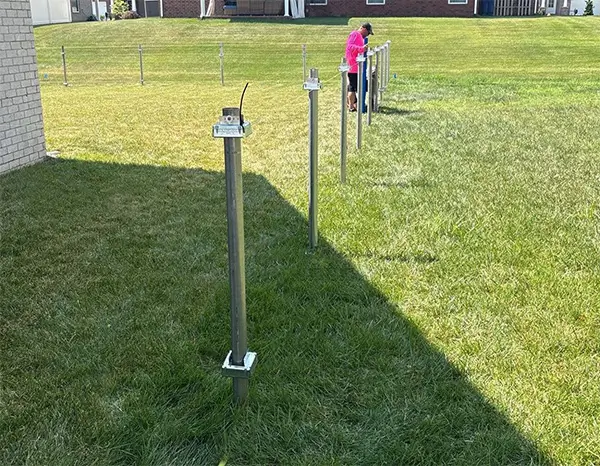 i Drive Power System uni-5 donut on a schedule 20 steel fence post - clean installation with no concrete